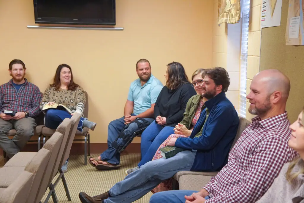 Adult couples sit in Sunday School class