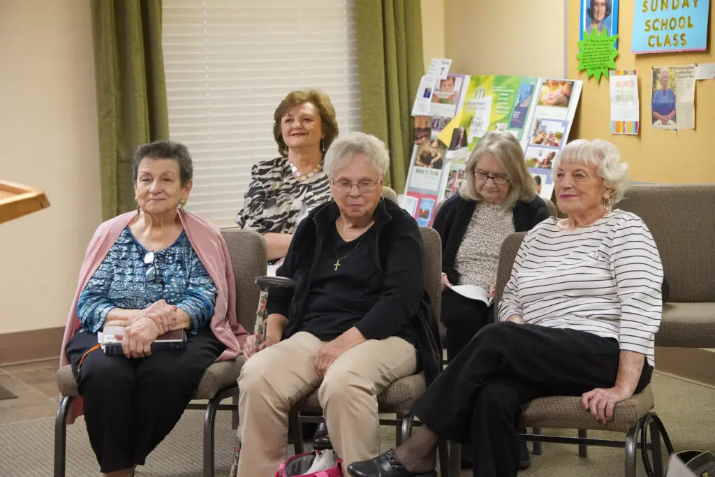 Senior adult women sit in their Sunday School class